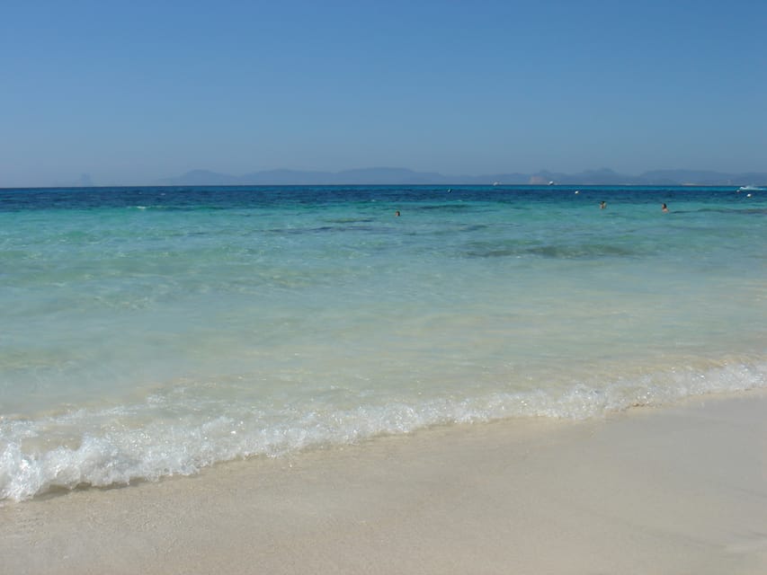 From Ibiza: Ferry and Guided Bus Excursion in Formentera - Es Pujols or Mitjorn for swimming and free time