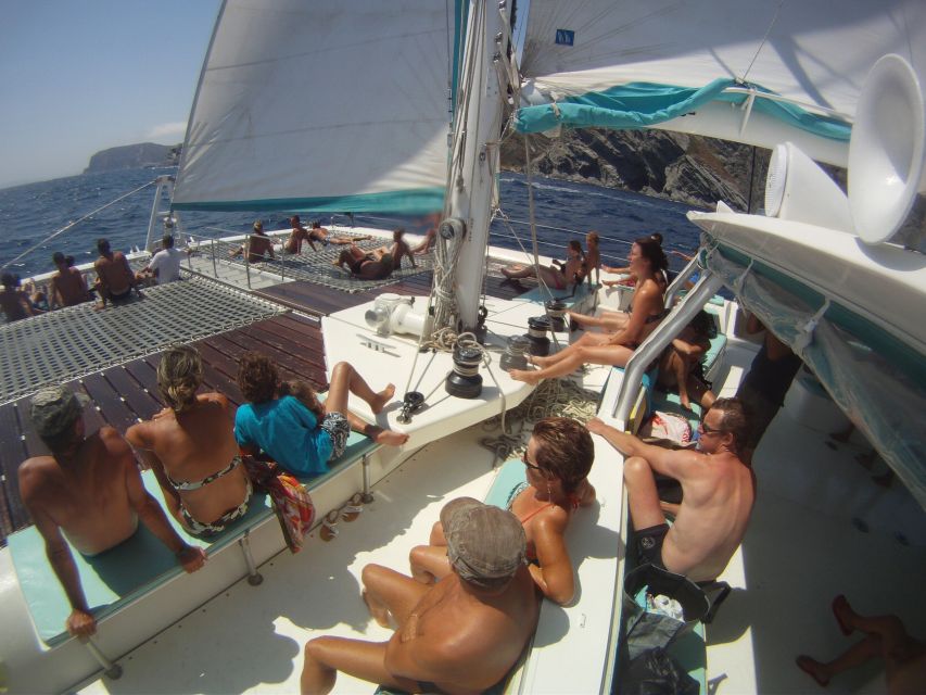 From Roses: Catamaran Cruise Cap Norfeu - Cadaqués - Leaving Roses for the Costa Brava cliffs