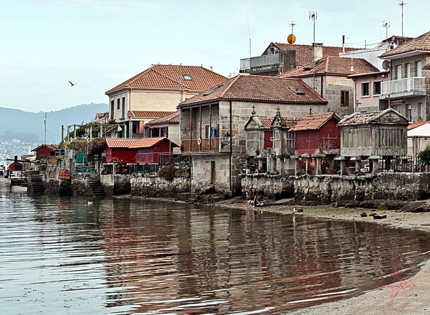 From Santiago: Tour to Rias Baixas with Boat Trip and Winery - Illa da Toxa adds hot springs, soap, and a shell-covered chapel