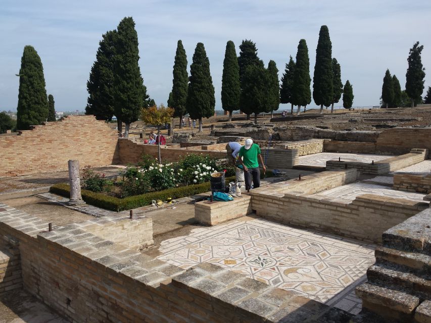 From Seville: Italica Roman City & Medieval Monastery Tour - Walking through Italica’s Roman streets