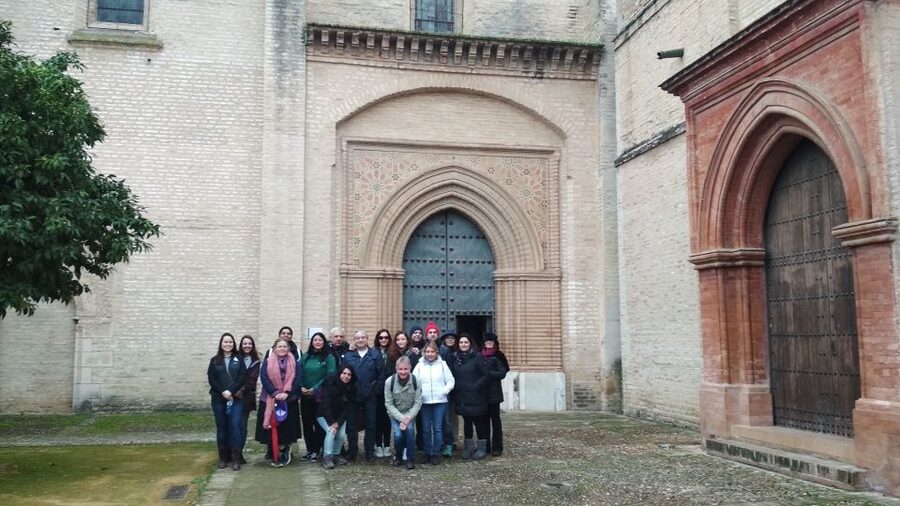 From Seville: Italica Roman City & Medieval Monastery Tour - Inside the 25,000-seat amphitheater