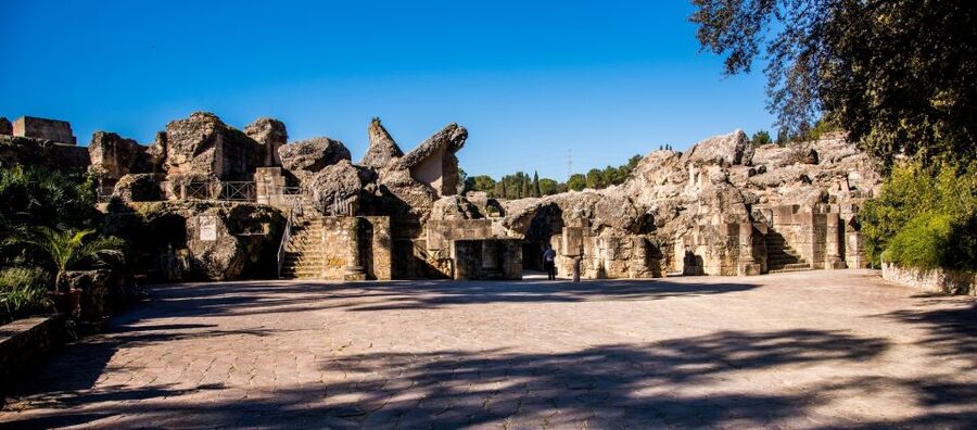 From Seville: Italica Roman City Tour - The Roman theater in Santiponce