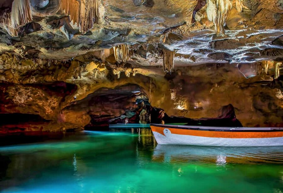 From Valencia: Caves of San José Guided Tour & Boat Ride - Boarding the boat inside the cave