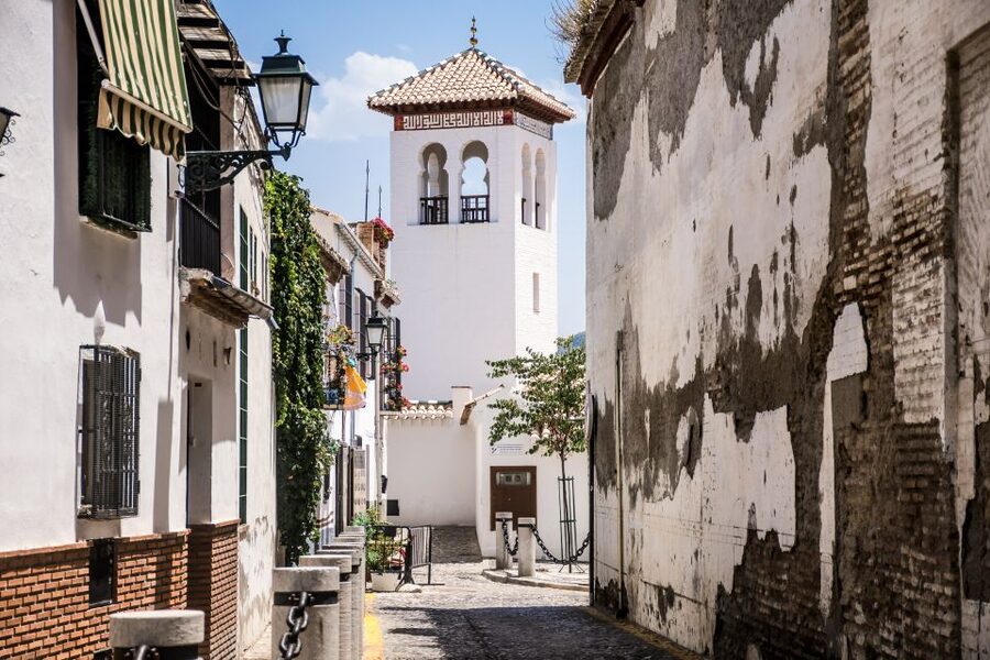 Granada: Alhambra Full Complex & Andalusi Monuments Tickets - Taking the ticket down to Albaicín