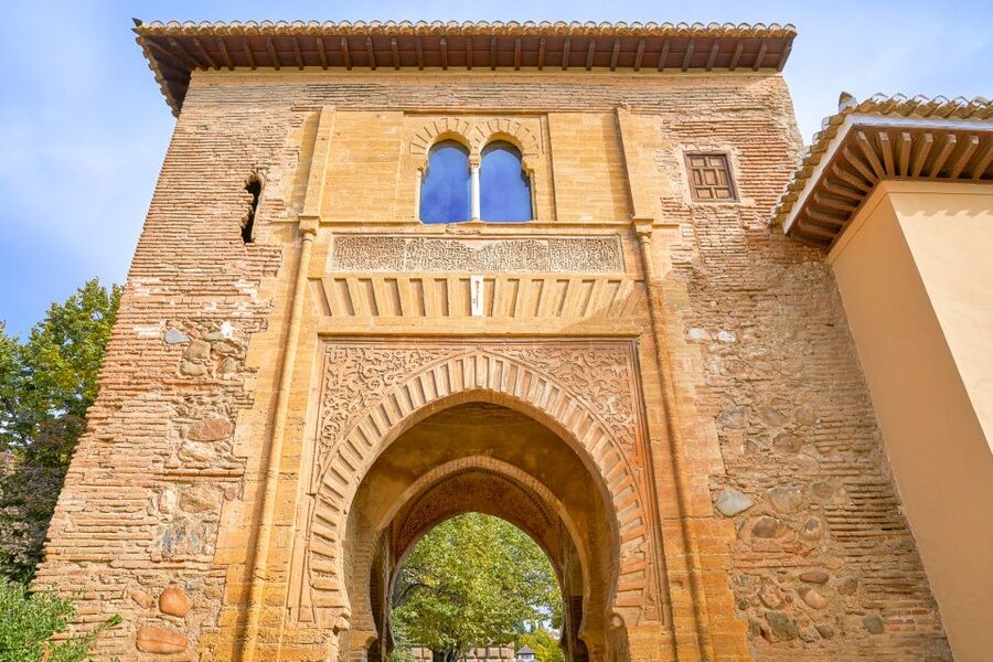Granada: Alhambra Small Group Tour with Nasrid Palaces - Carlos V Palace, a bold Christian addition