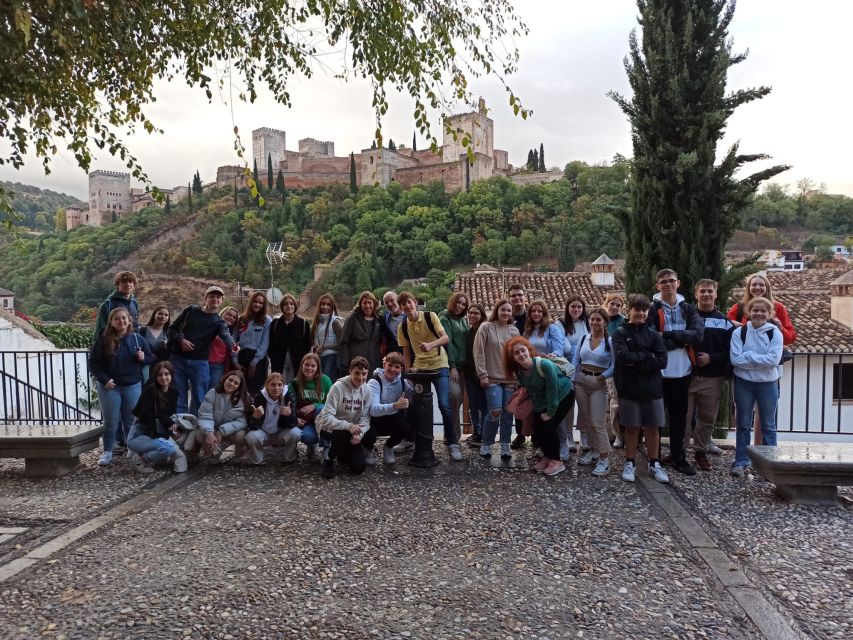 Granada: Historic Center and Lower Albaicin Walking Tour - Corral del Carbón and Granada’s commercial past