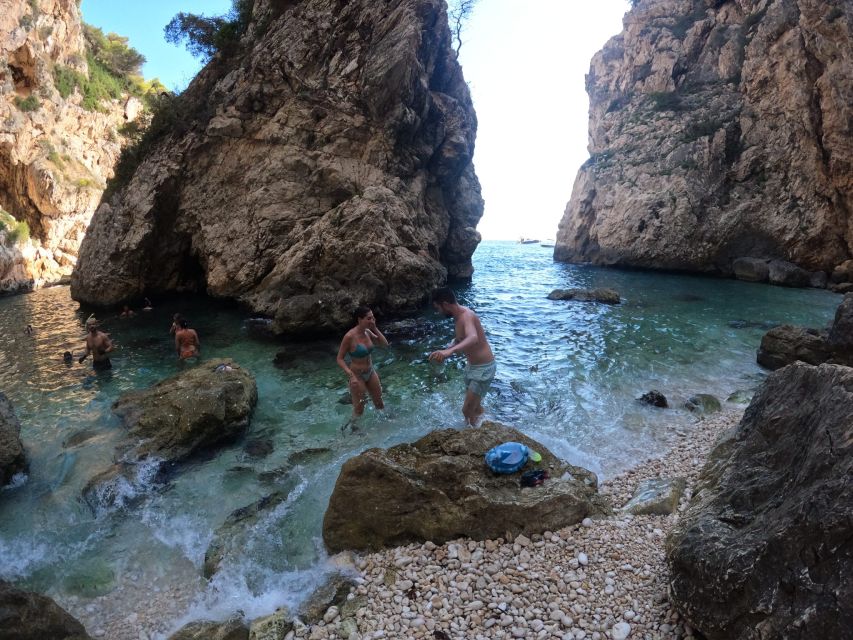 Granadella: Caló, Cova Llop Marí, and Ambolo Kayak Trip - Cala Caló: the main swimming and snorkeling stop