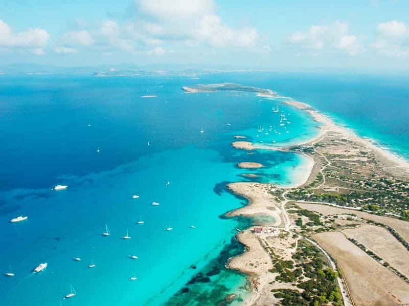 Ibiza: Formentera Cruise at Ibiza Boat Club - Paella, wine, and a Café Caleta finale
