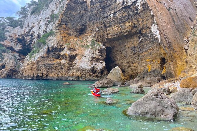 Kayak Paradise: Cala Portixol Snorkel, Cave & Cliff Jumping Tour - The Blue Lagoon and Optional Cliff Jumping