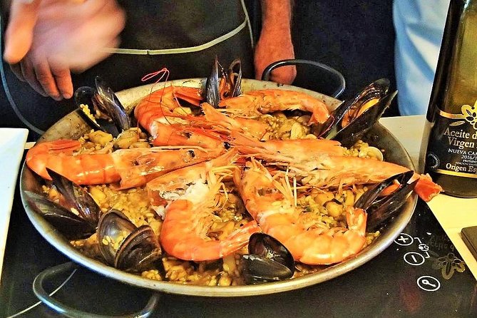 La Boqueria Market and Paella Cooking Class in Barcelona - Shopping for ideas inside La Boqueria