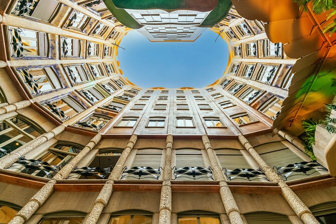 La Pedrera-Casa Mila Admission Ticket with Audioguide - The courtyards reveal Gaudí’s practical side