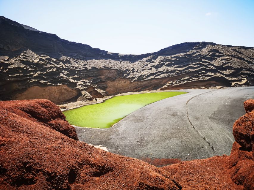 Lanzarote: Full-Day Island Highlights Tour - Cliffs, palms, and the northern side of Lanzarote