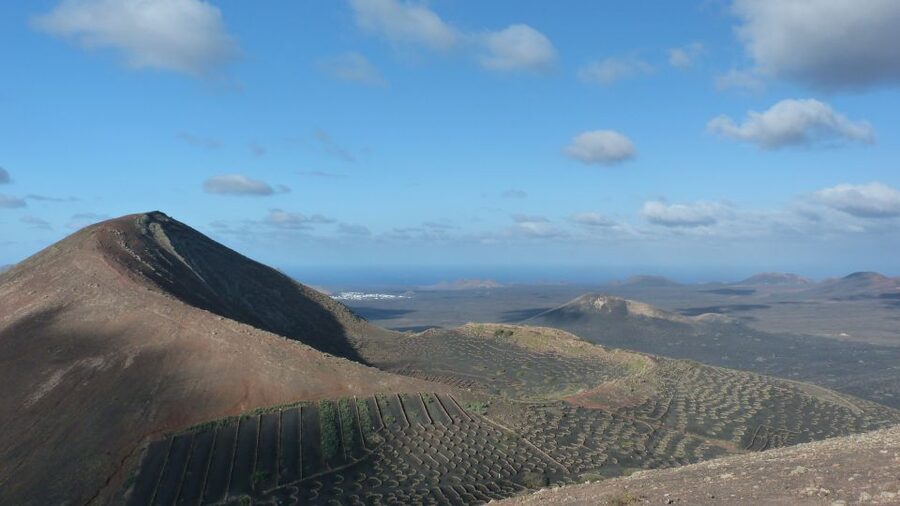 Lanzarote: La Geria Vineyards Hiking Tour - The climb toward Lanzarote’s third-highest point