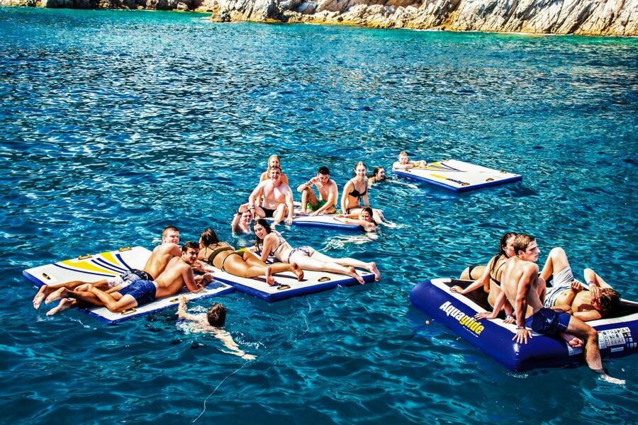Lloret de Mar: Catamaran Sailing Cruise with BBQ and Drinks - Two hours anchored for swimming and snorkeling