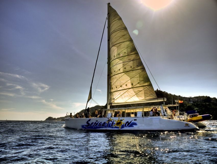 Lloret de Mar: Sunset Catamaran Cruise with DJ and Drinks - What the catamaran ride feels like