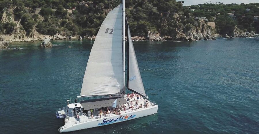 Lloret de Mar: Sunset Catamaran Cruise with DJ and Drinks - Leaving Passeig Agustí Font