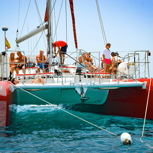 Lobos Island: 4-Hour Catamaran Trip with Lunch - Swimming, snorkeling, and paddle surfing from the catamaran