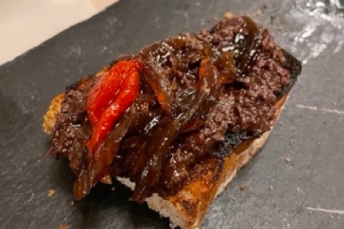Madrid by Night Small Group Tour: Stories, Sights and Tapas Bites - Starting at Ópera as Madrid heads into the evening