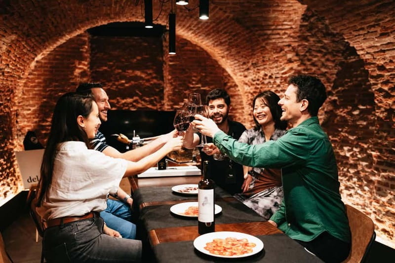 Madrid: Guided Tapas and Wine Tour with Terrace Visit - Iberian ham, chorizo, and the taste of Spain