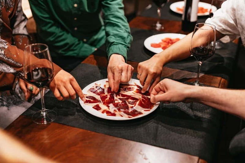 Madrid: Guided Tapas and Wine Tour with Terrace Visit - Plaza Mayor and Los Austrias between courses