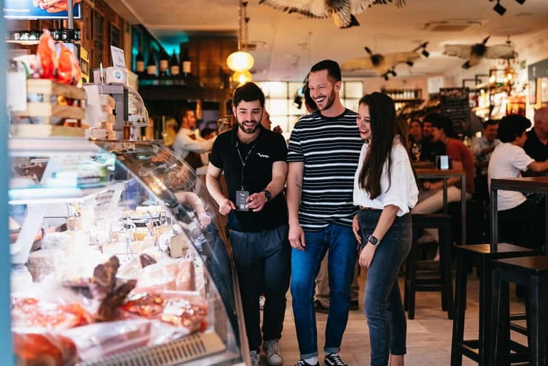 Madrid: Guided Tapas and Wine Tour with Terrace Visit - Huertas and the beef cheek course