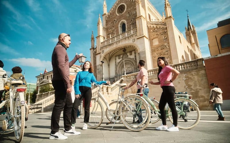 Madrid: Highlights Guided Vintage Bike Tour and Tapas Option - Key points at a glance