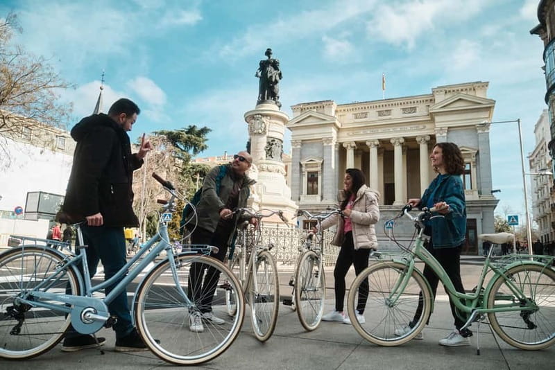 Madrid: Highlights Guided Vintage Bike Tour and Tapas Option - Puerta del Sol and Madrid’s official symbols