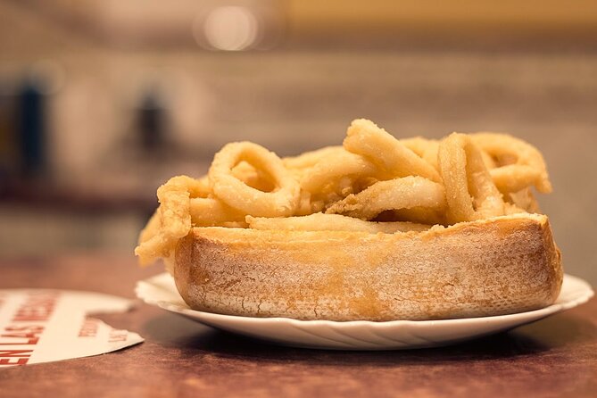 Madrid Historic Centre Food Tour with Authentic Tapas & Wines - Dinner inside an 18th-century building