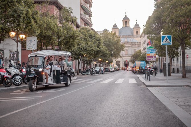 Madrid Historical Tour with Local Guide in Eco Tuk Tuk Private - Atocha Station, a transport landmark
