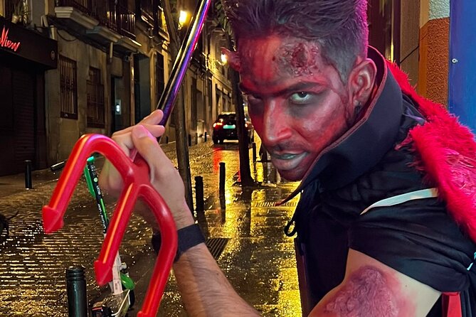 Madrid Oscuro: Torture, Ghosts, Crimes and Legends - Plaza Mayor: starting beneath the grand arcades