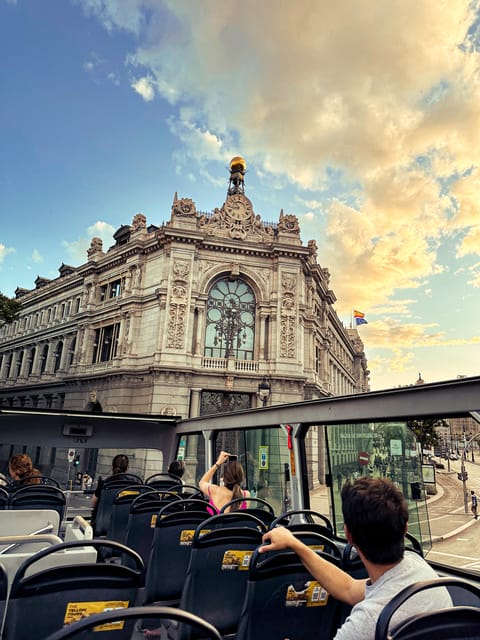 Madrid: Panoramic Open-Top Bus Day or Night Tour with Guide - Open-top comfort, photos, and weather