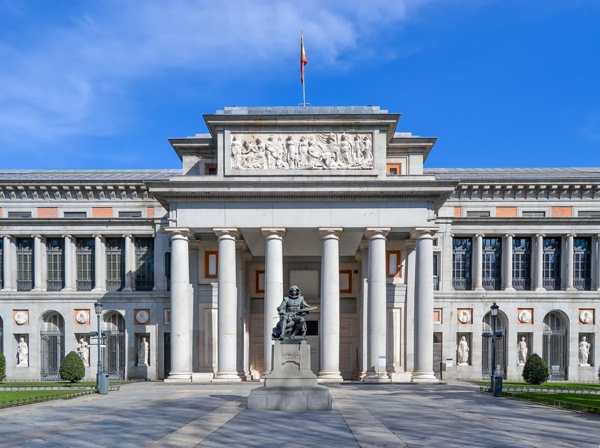 Madrid: Prado Museum Ticket with In-App Audio Guide - Collecting your ticket by the Goya statue