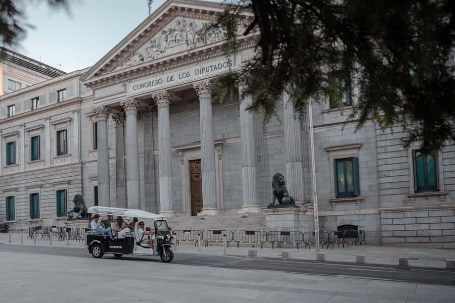 Madrid: Private City Tour by Eco Tuk Tuk - From San Miguel Market to Madrid’s literary quarter