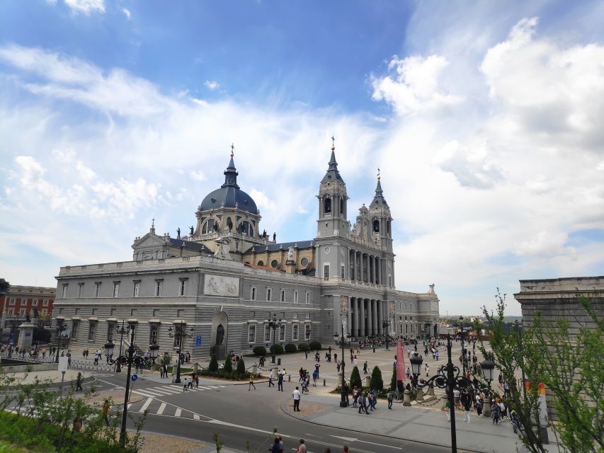 Madrid: Royal Palace and Almudena Cathedral Small-Group Tour - Almudena Cathedral’s mix of architectural styles