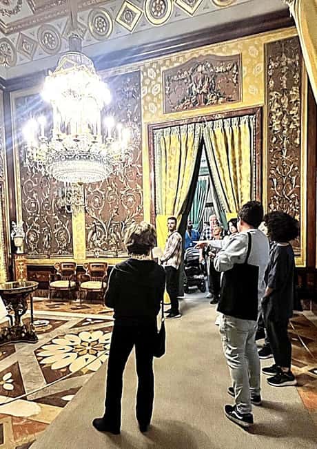 Madrid: Royal Palace Guided Tour with Entry Ticket - Royal collections: violins, crown, and throne