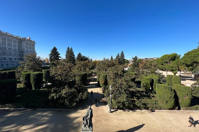 Madrid: Royal Palace Guided Tour with Skip the Line Ticket - Headsets, pacing, and group size