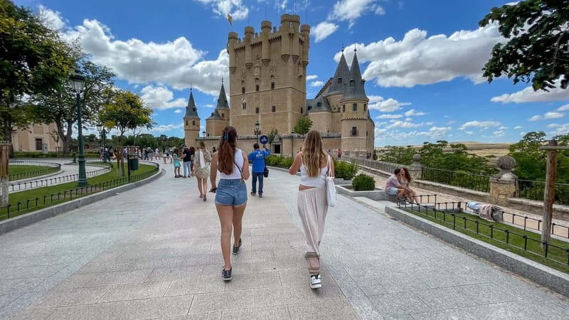 Madrid: Segovia & Ávila Full Day with Alcázar & Wall Tickets - Segovia’s Roman Aqueduct sets the tone