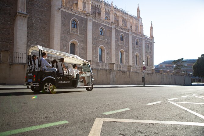 Madrid Welcome Tour with Local Guide in Eco Tuk Tuk Private - From a covered food market to San Francisco el Grande