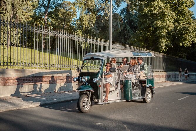 Madrid Welcome Tour with Local Guide in Eco Tuk Tuk Private - Atocha Station and Madrid’s modern rhythm