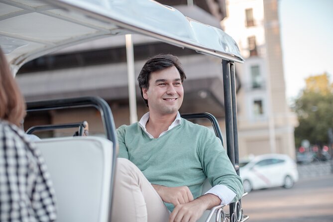 Madrid Welcome Tour with Local Guide in Eco Tuk Tuk Private - Congress, fountains, and football loyalties