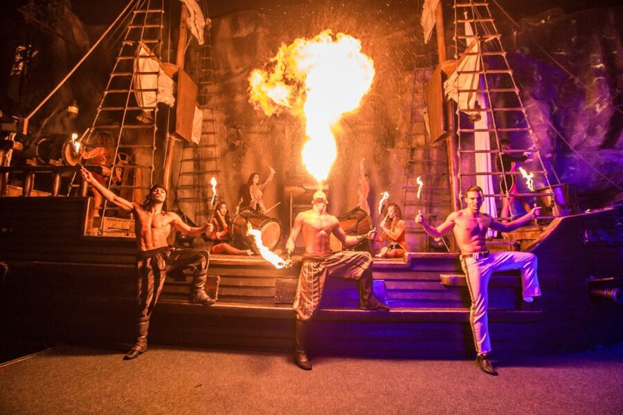 Magaluf: Pirates Adventure Dinner Show Ticket - Dinner arrives while the action keeps moving