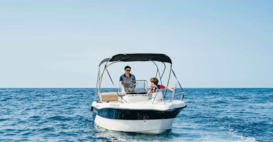 Malaga: Boat Rental without a License for Dolphin Watching - Taking the wheel off Benalmádena