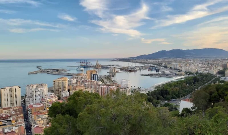 Malaga: Castle Hill and Fisherman Village E-Bike Tour - Key points at a glance