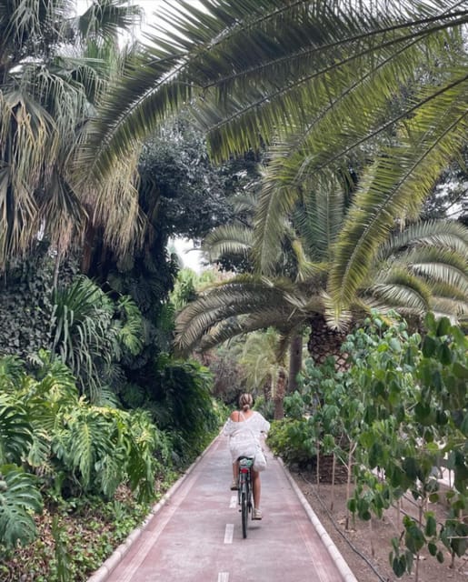 Malaga: Castle Hill and Fisherman Village E-Bike Tour - Miramar Palace and the ride back through the port