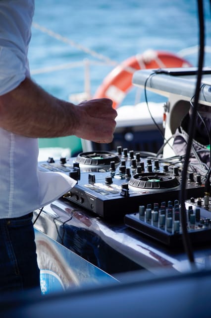 Malaga: Catamaran Sailing Cruise with Swimming & Optional DJ - The swimming stop is fun, but not a beach break