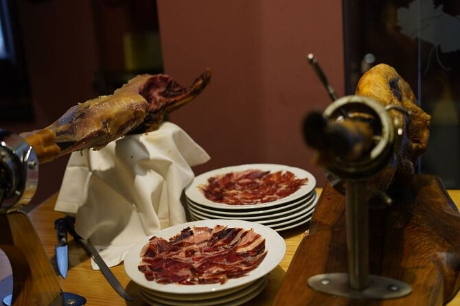 Málaga Evening Tapas Crawl Tour by Food Lover Tour - Stop two: fried aubergines, fish, and a local drink