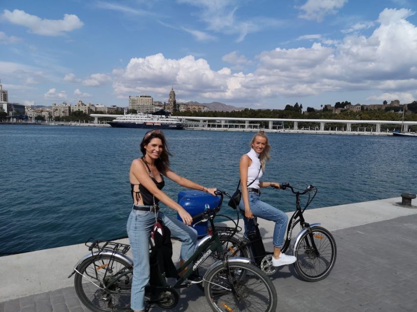 Malaga: Guided E-Bike Tour - Down past the Alcazaba walls