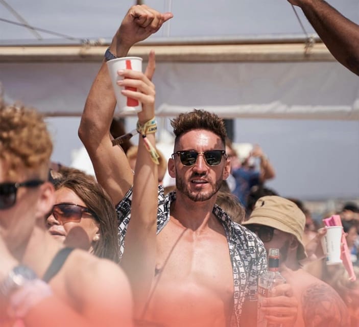 Mallorca: Boat Party with Live DJs, Lunch, & Nightclub Entry - Boarding at the Soller Cat Boat