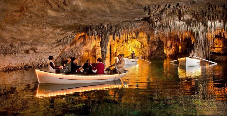 Mallorca: Drach and Hams Caves, and Porto Cristo Day Tour - Hams Caves: smaller, atmospheric, and full of odd shapes