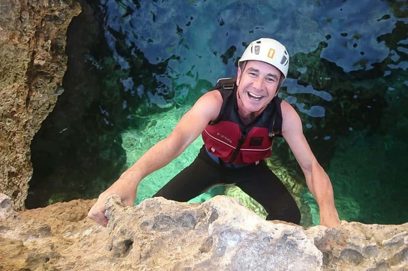 Mallorca Half-Day Coasteering Experience - Abseiling toward the water